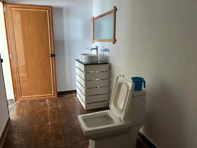 Bathroom with toilet at Purnam Yogashala Agonda Beach Goa