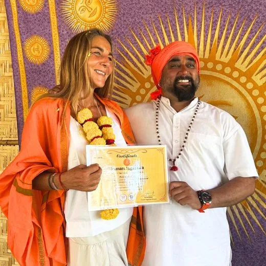 Yogi Manoj Ji presenting Yoga Alliance certificate to a graduate at Purnam Yogashala, Agonda Beach Goa